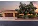 Charming single-story home with a tile roof, mature landscaping, and a spacious three-car garage at 13219 W Santa Ynez Dr, Sun City West, AZ 85375