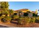 Inviting single-story home with an arched entryway, desert landscaping, and a charming, well-maintained exterior at 13219 W Santa Ynez Dr, Sun City West, AZ 85375