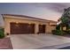 Charming single-story home with a tile roof, landscaped front yard, and a spacious three-car garage at 13219 W Santa Ynez Dr, Sun City West, AZ 85375