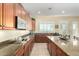 A gourmet kitchen with custom cabinetry, granite countertops, and stainless appliances at 13219 W Santa Ynez Dr, Sun City West, AZ 85375