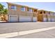 Exterior view of townhome garages, showcasing ample parking and architectural details at 1335 E June St # 221, Mesa, AZ 85203