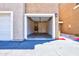 Open garage interior showing water heater with access to unit at 1335 E June St # 221, Mesa, AZ 85203