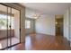 Spacious, unfurnished living room with sliding glass door access to covered balcony at 1335 E June St # 221, Mesa, AZ 85203