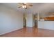 Living room with wood floors with view of kitchen at 1335 E June St # 221, Mesa, AZ 85203
