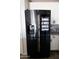 Stainless steel Samsung refrigerator with a built-in touchscreen at 1364 W Spine Tree Ave, Queen Creek, AZ 85140