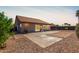Spacious backyard with a large patio, perfect for outdoor entertaining and relaxing, and desert landscaping at 13862 W Fargo Dr, Surprise, AZ 85374