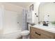 Bathroom with a shower over tub and modern sink vanity at 13862 W Fargo Dr, Surprise, AZ 85374