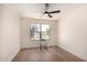 Bedroom with ceiling fan, one window and wood-look flooring at 13862 W Fargo Dr, Surprise, AZ 85374