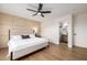 Cozy bedroom with a bed, closet, and a side table with lighting at 13862 W Fargo Dr, Surprise, AZ 85374