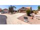 Charming desert home with a two-car garage, drought-tolerant landscaping, and a welcoming entrance at 13862 W Fargo Dr, Surprise, AZ 85374