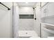Tiled shower with modern fixtures and a built-in niche at 13862 W Fargo Dr, Surprise, AZ 85374
