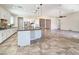 Open kitchen featuring a large island, granite countertops, and stainless steel appliances at 14572 W Medlock Dr, Litchfield Park, AZ 85340