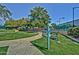 Community park sign, playground, and green space with walking paths and benches for community enjoyment at 15928 W Zinnia Ct, Surprise, AZ 85374