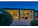 View of the covered patio with outdoor seating and access to the house at 15928 W Zinnia Ct, Surprise, AZ 85374