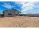 Home with spacious dirt backyard and block wall offering customization at 16004 W Honeysuckle Dr, Surprise, AZ 85387