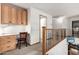 Bright hallway area, featuring an open desk and stylish banister at 16210 W Durango St, Goodyear, AZ 85338