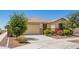 Single Gathering home with desert landscaping at 17345 W Spur Dr, Surprise, AZ 85387