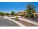 Single Gathering home with desert landscaping at 17345 W Spur Dr, Surprise, AZ 85387