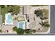 Aerial view of property showcasing the pool, putting green, and landscaping at 1750 E Mallory St, Mesa, AZ 85203