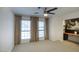 Neutral bedroom with two windows and a desk area at 1750 E Mallory St, Mesa, AZ 85203