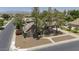 Beautiful single-Gathering home with mature landscaping showcasing the home's architectural design and curb appeal at 1750 E Mallory St, Mesa, AZ 85203