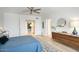 Serene main bedroom featuring a light interior, hardwood floors, and closet access at 1750 E Mallory St, Mesa, AZ 85203