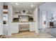 Convenient home office space with built-in desk and shelves, adjacent to other rooms at 1750 E Mallory St, Mesa, AZ 85203