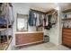Well-organized walk-in closet featuring shelving, drawers, and hanging space at 1750 E Mallory St, Mesa, AZ 85203