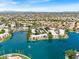 Breathtaking aerial view showcasing a community nestled around a lake with city views at 1825 W Ray Rd # 1119, Chandler, AZ 85224