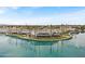 An aerial view of lakefront community with shops, restaurants and palm trees in a walkable environment at 1825 W Ray Rd # 1119, Chandler, AZ 85224