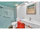 Stylish bathroom with a walk-in shower, vibrant vanity, and modern fixtures at 1825 W Ray Rd # 1119, Chandler, AZ 85224