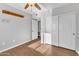 Clean bedroom with a ceiling fan, wood-look floors and a closet at 1825 W Ray Rd # 1119, Chandler, AZ 85224