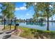 Lakeside community featuring serene waters, lush greenery, and grilling stations for residents to enjoy at 1825 W Ray Rd # 1119, Chandler, AZ 85224