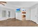 Open-concept living area with tile floors and views into the updated kitchen at 1825 W Ray Rd # 1119, Chandler, AZ 85224