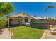 Fenced backyard featuring an above-ground pool, covered patio, and lush green lawn at 1950 E Kings Ave, Phoenix, AZ 85022