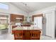 Kitchen with a functional island, tile floors, white appliances, lots of storage and natural light at 1950 E Kings Ave, Phoenix, AZ 85022