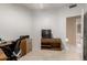 Office features a desk setup, natural light, and carpeting at 1950 E Kings Ave, Phoenix, AZ 85022