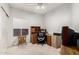 Office features a desk setup, natural light, and carpeting at 1950 E Kings Ave, Phoenix, AZ 85022