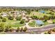 Aerial view of community with park, basketball court, and green spaces, showcasing a vibrant lifestyle at 19506 N 73Rd Ave, Glendale, AZ 85308