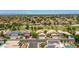 Scenic aerial view of a neighborhood featuring well-kept lawns, and community amenities, creating a peaceful atmosphere at 19506 N 73Rd Ave, Glendale, AZ 85308