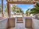 Backyard featuring mature trees, landscape features, and a relaxing ambiance at 19506 N 73Rd Ave, Glendale, AZ 85308