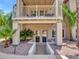 Charming exterior featuring a balcony, well-maintained landscaping, and inviting architectural details at 19506 N 73Rd Ave, Glendale, AZ 85308