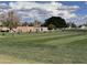 Expansive golf course view featuring a manicured green and a blue sky with fluffy white clouds at 19506 N 73Rd Ave, Glendale, AZ 85308