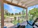 Relaxing outdoor patio with comfortable seating, offering scenic views of the green surroundings and blue sky at 19506 N 73Rd Ave, Glendale, AZ 85308