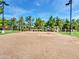A sand volleyball court offers a fun, active, and social recreational opportunity in a well-maintained community area at 19506 N 73Rd Ave, Glendale, AZ 85308