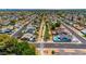 Picturesque aerial view of a residential neighborhood with well-maintained homes, swimming pools, and tree-lined streets at 2025 E Magdalena Dr, Tempe, AZ 85283