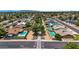 Aerial view of a residential area boasting pools, manicured lawns and community walking paths for neighborly connection at 2025 E Magdalena Dr, Tempe, AZ 85283