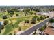 Panoramic aerial view of a lush community park with a mix of open green spaces and mature trees at 2025 E Magdalena Dr, Tempe, AZ 85283