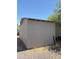 Exterior view of the shed shows basic construction and size relative to the surroundings at 2060 N Center St # 282, Mesa, AZ 85201