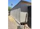 Exterior side view of the home, showcasing potential for upgrades at 2060 N Center St # 282, Mesa, AZ 85201